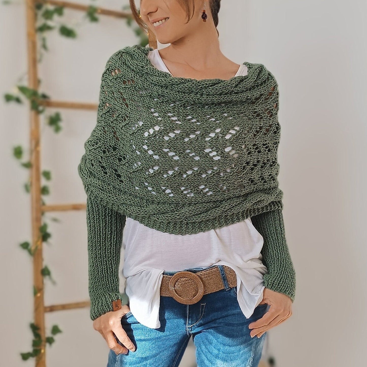 LD | Elegante gebreide wikkeltrui met opengewerkt detail