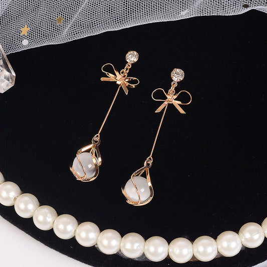 Elegant Pearl Bow Earrings