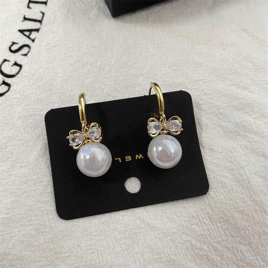 Elegant Pearl Bow Earrings
