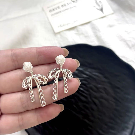 Elegant Pearl Bow Earrings