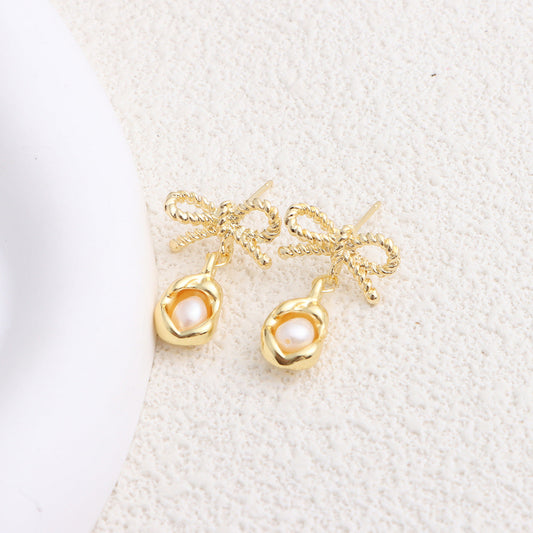 Elegant Pearl Bow Earrings