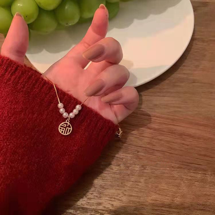Elegant Pearl Chinese Fu Charm