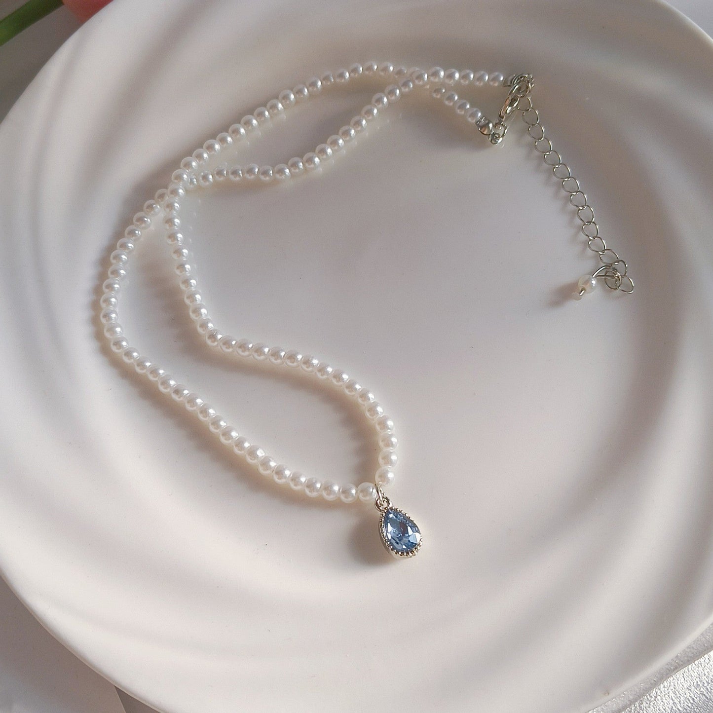 Elegant Pearl Strand Blue Teardrop