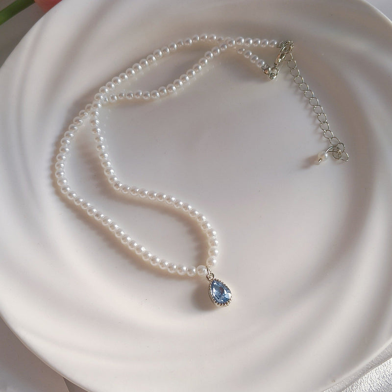 Elegant Pearl Strand Blue Teardrop