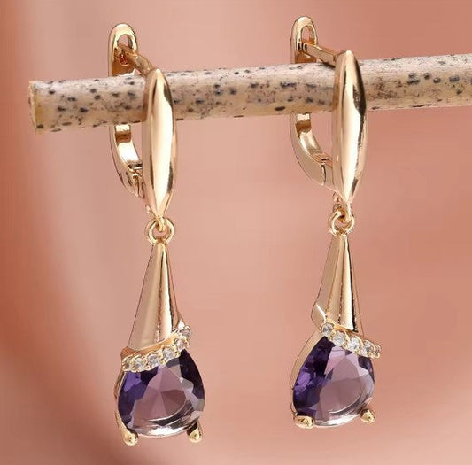Elegant Purple Zircon Stone Gold