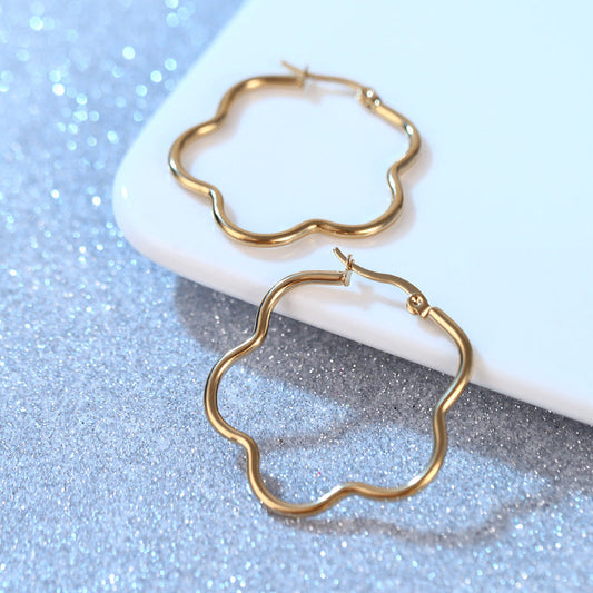 Elegant Wavy Gold Earrings