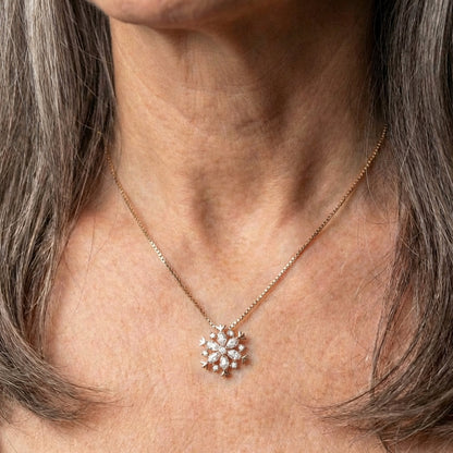 Glittering Snowflake Crystal Necklace In Gold And Silver