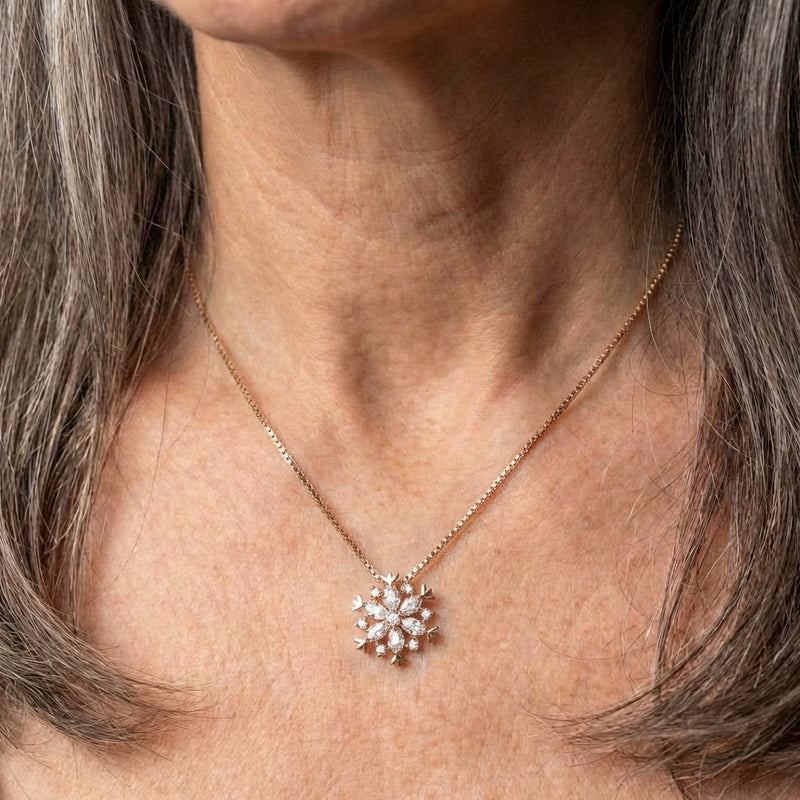 Glittering Snowflake Crystal Necklace In Gold And Silver