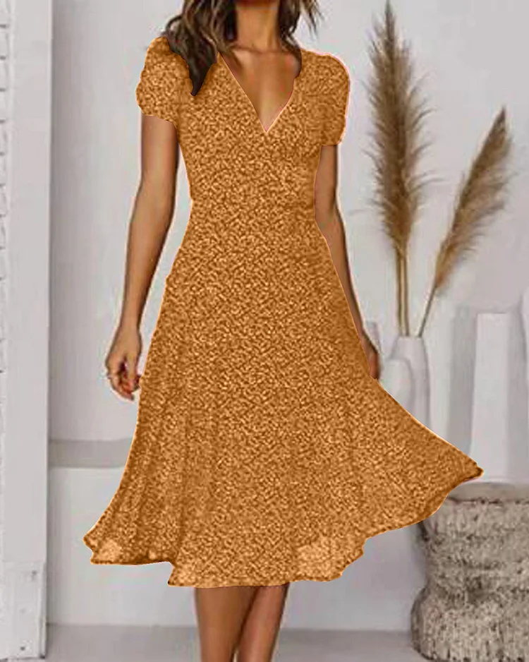 LD | Bedrukte chiffon jurk met korte mouwen en V-halslijn