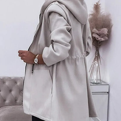 Fris en vrouwelijk Jas