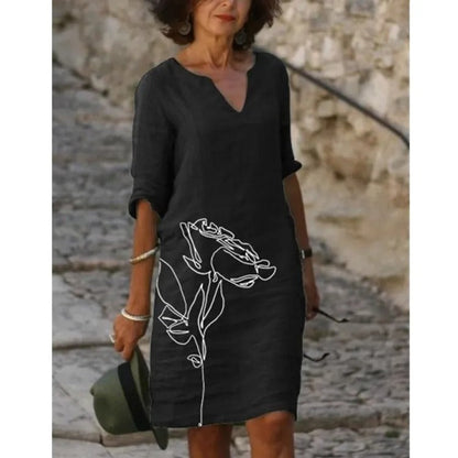 LD | Midi-jurk met V-hals en bloemenpatroon