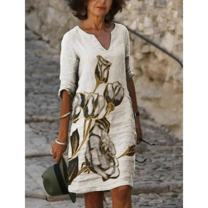 LD | Midi-jurk met V-hals en bloemenpatroon